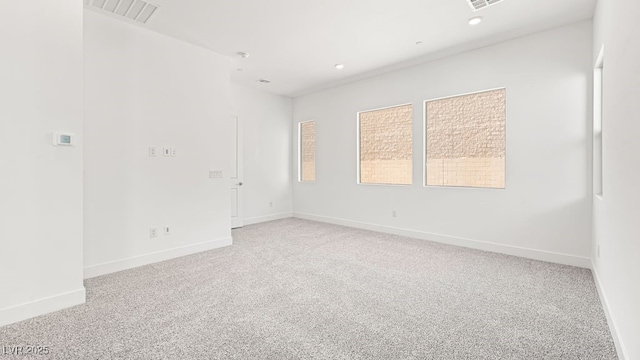 362 Tigullio Ave, Henderson, NV 89011 - spare room featuring light carpet, baseboards, and recessed lighting
