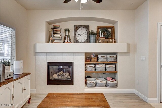 67 Dow Jones St Unit 2, Henderson, NV 89074 - living room featuring ceiling fan, light wood finished floors, and baseboards