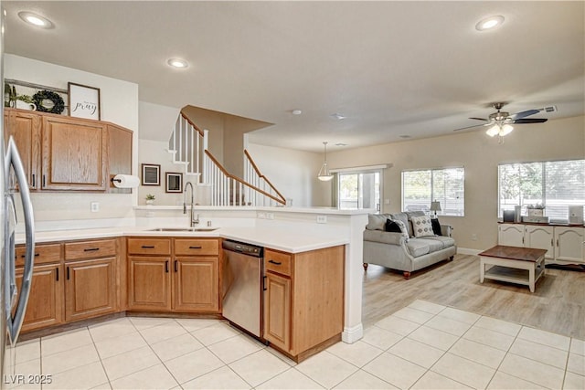 67 Dow Jones St Unit 2, Henderson, NV 89074 - kitchen with dishwasher, a sink, a peninsula, open floor plan, and ceiling fan