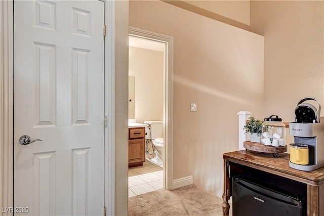 67 Dow Jones St Unit 2, Henderson, NV 89074 - bathroom with tile patterned floors, toilet, and vanity