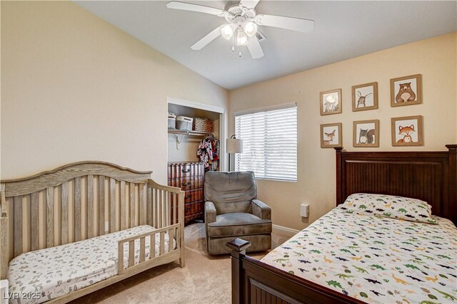 67 Dow Jones St Unit 2, Henderson, NV 89074 - bedroom with light carpet, vaulted ceiling, a ceiling fan, and baseboards
