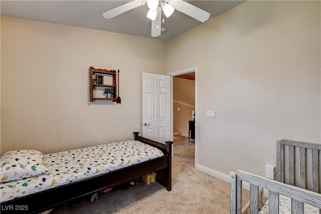 67 Dow Jones St Unit 2, Henderson, NV 89074 - bedroom with light carpet, a ceiling fan, and baseboards