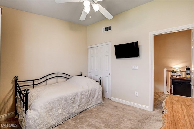 67 Dow Jones St Unit 2, Henderson, NV 89074 - carpeted bedroom featuring a closet, baseboards, and a ceiling fan