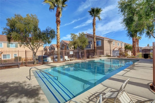 67 Dow Jones St Unit 2, Henderson, NV 89074 - community pool with a residential view and a patio