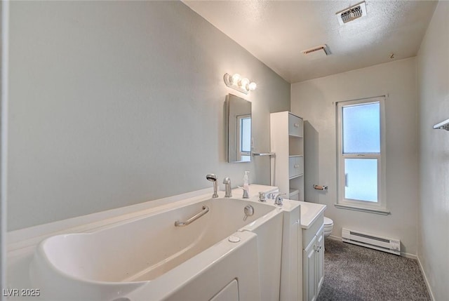 3143 El Chico Ct, Las Vegas, NV 89120 - bathroom with a baseboard radiator, a bath, toilet, a textured ceiling, and baseboards