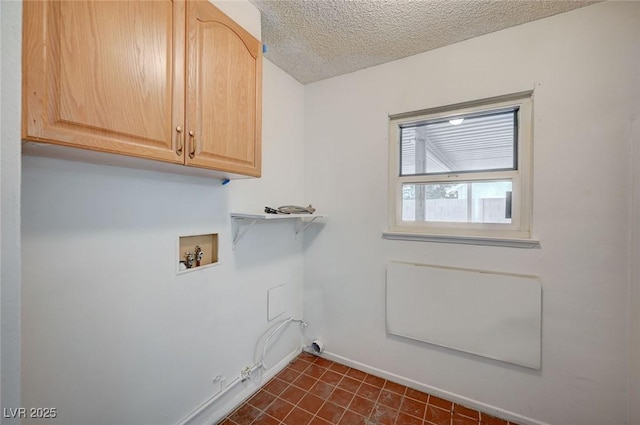 3143 El Chico Ct, Las Vegas, NV 89120 - laundry area featuring washer hookup, cabinet space, hookup for a gas dryer, a textured ceiling, and baseboards