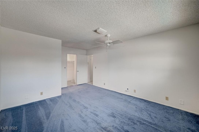 3143 El Chico Ct, Las Vegas, NV 89120 - spare room with a ceiling fan, carpet floors, a textured ceiling, and baseboards