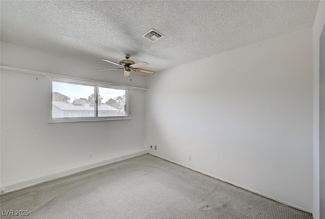 3143 El Chico Ct, Las Vegas, NV 89120 - empty room featuring ceiling fan, light carpet, a textured ceiling, and baseboards
