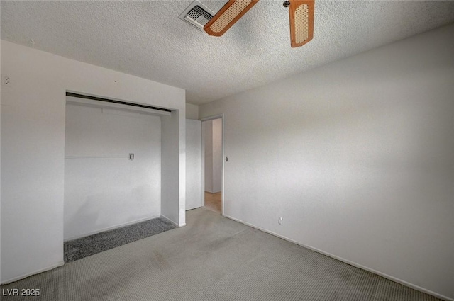 3143 El Chico Ct, Las Vegas, NV 89120 - unfurnished bedroom featuring carpet floors, a closet, a ceiling fan, and a textured ceiling
