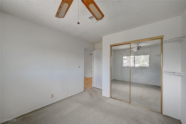 3143 El Chico Ct, Las Vegas, NV 89120 - unfurnished bedroom featuring carpet, a closet, a ceiling fan, and a textured ceiling