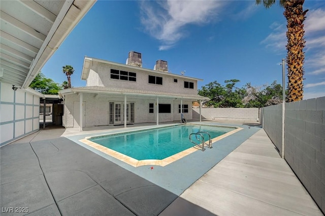 3143 El Chico Ct, Las Vegas, NV 89120 - view of swimming pool with a patio area, a fenced backyard, and french doors
