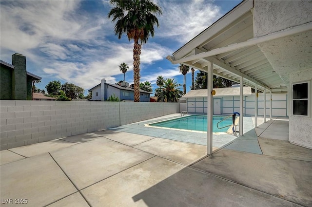 3143 El Chico Ct, Las Vegas, NV 89120 - view of swimming pool featuring a patio area, a fenced backyard, and an outdoor structure
