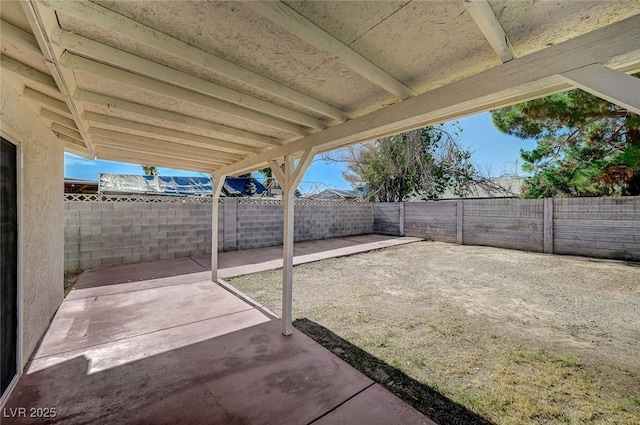 4496 Skyview Dr, Las Vegas, NV 89104 - fenced backyard featuring a patio area