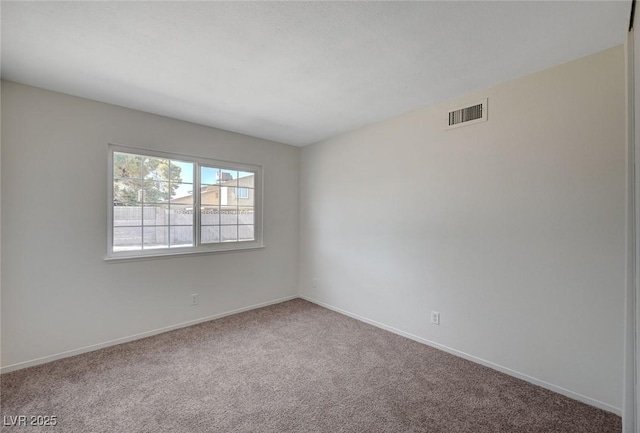 4496 Skyview Dr, Las Vegas, NV 89104 - spare room featuring carpet flooring and baseboards