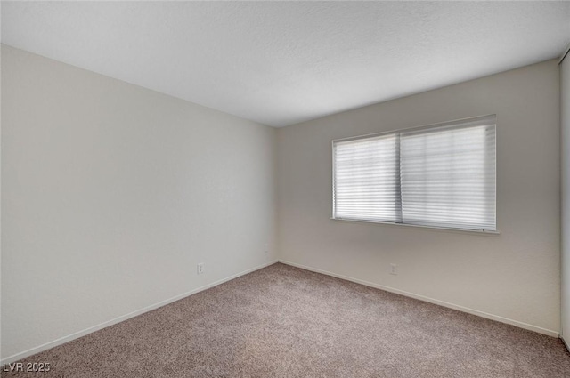 4496 Skyview Dr, Las Vegas, NV 89104 - spare room with carpet and baseboards