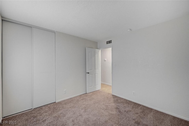 4496 Skyview Dr, Las Vegas, NV 89104 - unfurnished bedroom featuring carpet, baseboards, and a closet