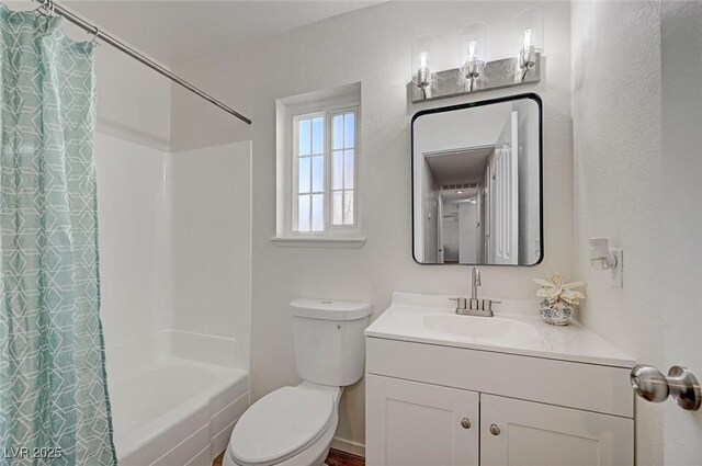 4496 Skyview Dr, Las Vegas, NV 89104 - bathroom featuring vanity, shower / tub combo with curtain, and toilet