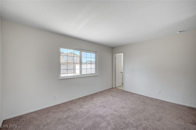 4496 Skyview Dr, Las Vegas, NV 89104 - carpeted spare room with baseboards