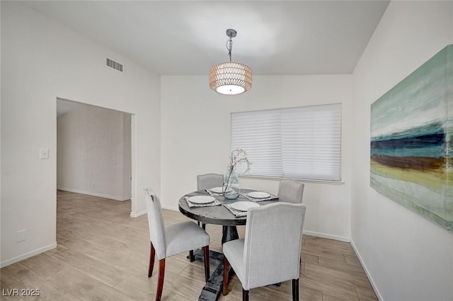 4496 Skyview Dr, Las Vegas, NV 89104 - dining space with baseboards and wood finished floors