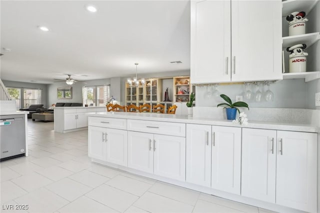 3966 Crystal Trip Ct, Las Vegas, NV 89129 - kitchen featuring a peninsula, open shelves, open floor plan, light countertops, and white cabinets