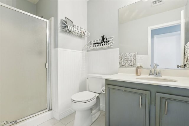 3966 Crystal Trip Ct, Las Vegas, NV 89129 - bathroom with vanity, a stall shower, toilet, and tile patterned flooring