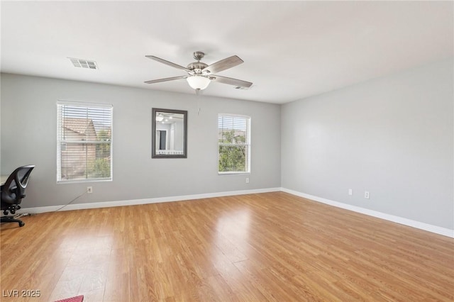 3966 Crystal Trip Ct, Las Vegas, NV 89129 - empty room featuring light wood-style floors, baseboards, and ceiling fan