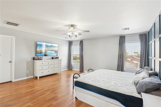 3966 Crystal Trip Ct, Las Vegas, NV 89129 - bedroom with light wood-style flooring, baseboards, and a ceiling fan