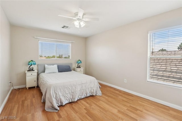 3966 Crystal Trip Ct, Las Vegas, NV 89129 - bedroom featuring baseboards, light wood-type flooring, and ceiling fan