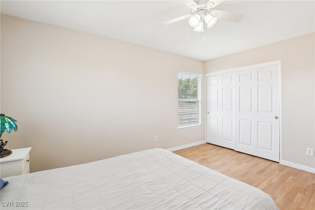 3966 Crystal Trip Ct, Las Vegas, NV 89129 - bedroom featuring wood finished floors, baseboards, ceiling fan, and a closet