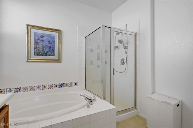 2851 Glistening Grove Ave, Henderson, NV 89052 - full bath with a stall shower, a bath, vanity, and tile patterned floors