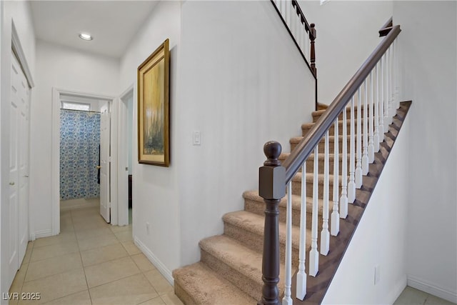 2851 Glistening Grove Ave, Henderson, NV 89052 - stairs with baseboards, tile patterned flooring, and recessed lighting