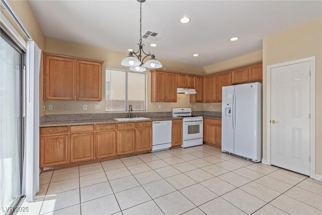 3037 Austin Pale Ave, North Las Vegas, NV 89081 - kitchen featuring white appliances, a sink, a chandelier, light tile patterned floors, and under cabinet range hood