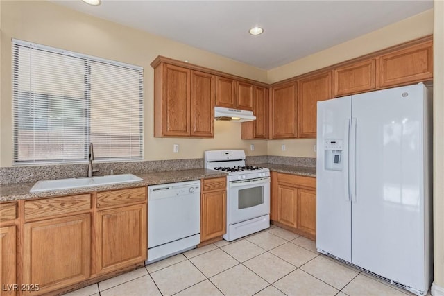 3037 Austin Pale Ave, North Las Vegas, NV 89081 - kitchen featuring white appliances, a sink, under cabinet range hood, light tile patterned floors, and recessed lighting