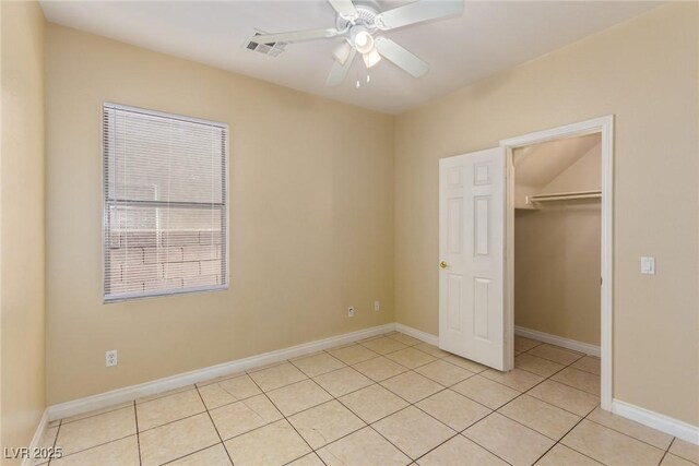 3037 Austin Pale Ave, North Las Vegas, NV 89081 - unfurnished bedroom featuring light tile patterned floors, a closet, ceiling fan, and baseboards