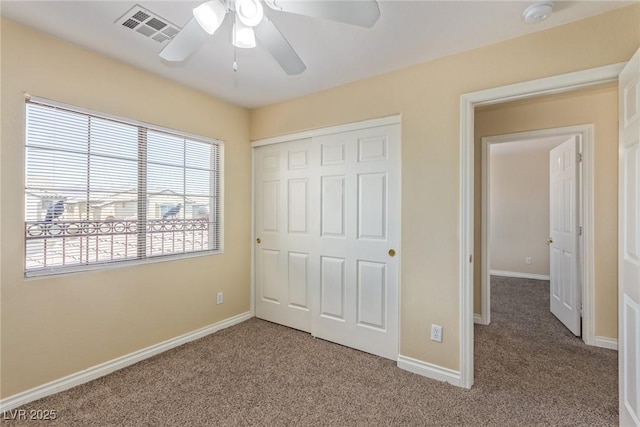 3037 Austin Pale Ave, North Las Vegas, NV 89081 - unfurnished bedroom featuring light colored carpet, a closet, baseboards, and a ceiling fan