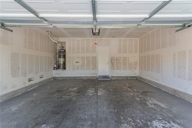 3037 Austin Pale Ave, North Las Vegas, NV 89081 - garage featuring strapped water heater and a garage door opener