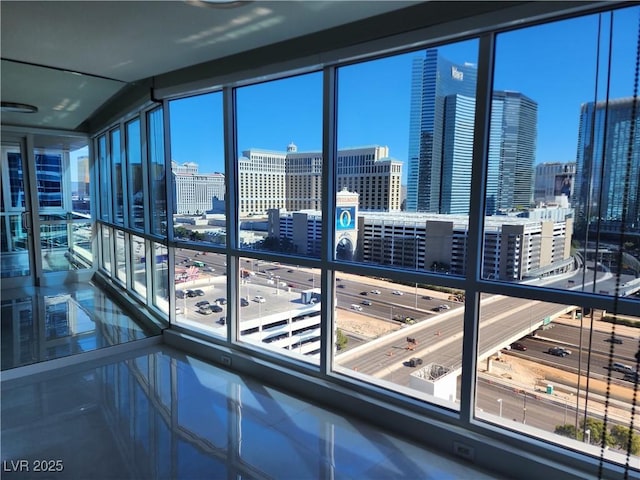 4525 Dean Martin Dr Unit 1507, Las Vegas, NV 89103 - interior space with a city view, plenty of natural light, and lofted ceiling
