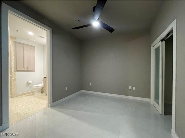 4525 Dean Martin Dr Unit 1507, Las Vegas, NV 89103 - unfurnished bedroom with connected bathroom and ceiling fan