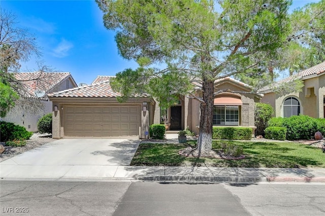 9220 Evergreen Canyon Dr, Las Vegas, NV 89134 - mediterranean / spanish-style home with a tiled roof, stucco siding, a garage, and driveway