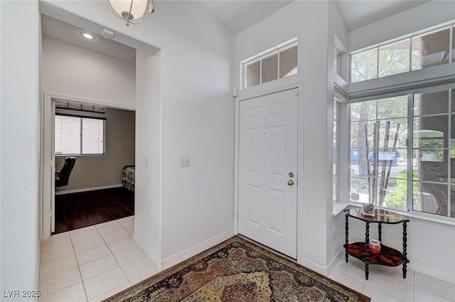 9220 Evergreen Canyon Dr, Las Vegas, NV 89134 - entryway with light tile patterned floors and baseboards