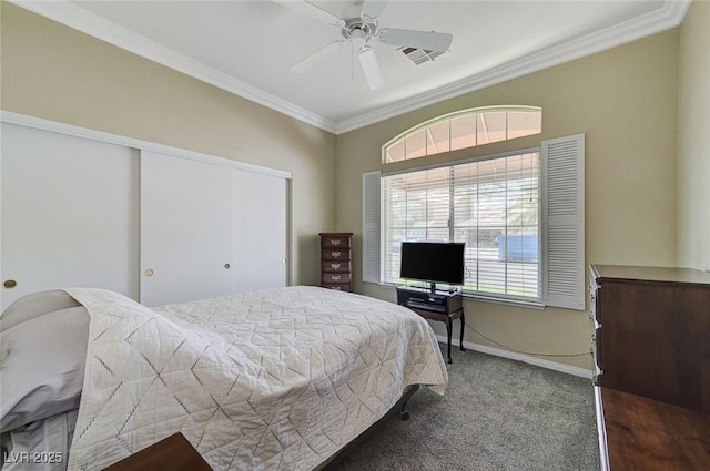 9220 Evergreen Canyon Dr, Las Vegas, NV 89134 - carpeted bedroom with a closet, ornamental molding, baseboards, and a ceiling fan