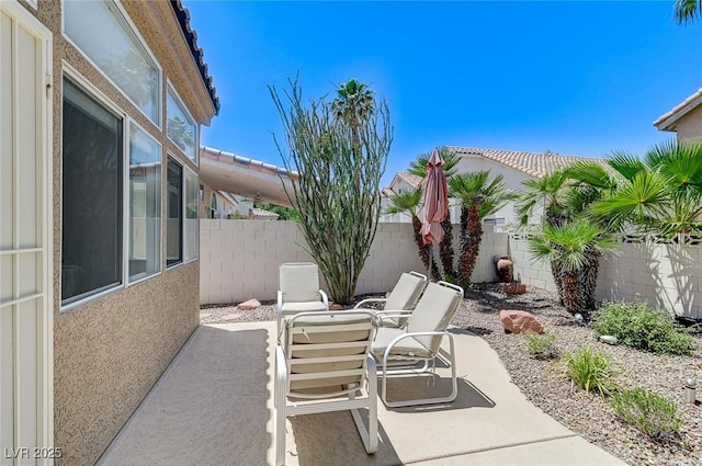 9220 Evergreen Canyon Dr, Las Vegas, NV 89134 - fenced backyard featuring a patio area