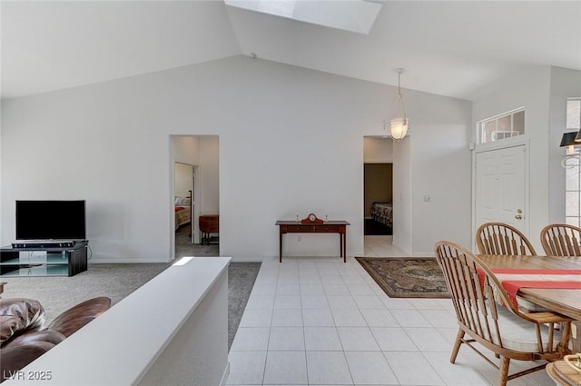 9220 Evergreen Canyon Dr, Las Vegas, NV 89134 - living area with a skylight, high vaulted ceiling, and baseboards