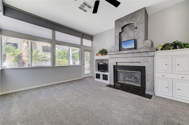 9220 Evergreen Canyon Dr, Las Vegas, NV 89134 - carpeted living area featuring ceiling fan, a premium fireplace, and baseboards
