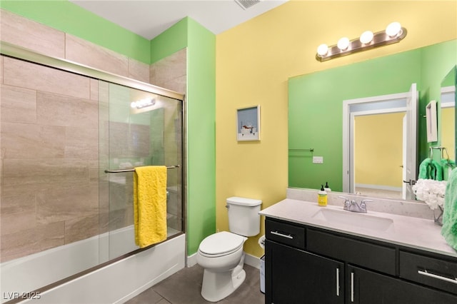3159 Via Como, Henderson, NV 89044 - full bath featuring toilet, vanity, enclosed tub / shower combo, and tile patterned floors