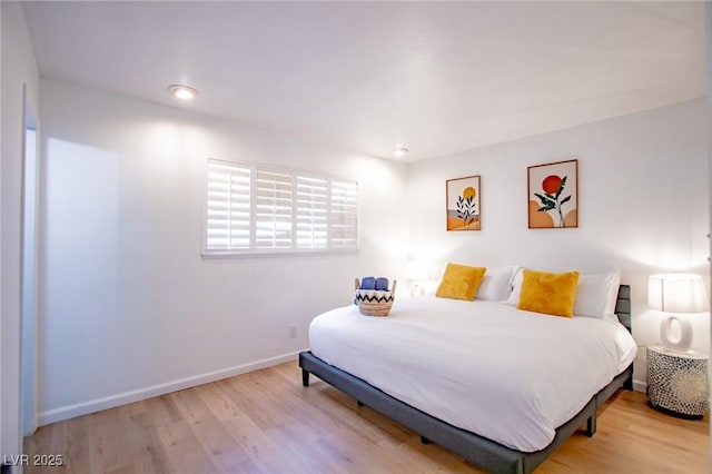 6301 Garwood Ave, Las Vegas, NV 89107 - bedroom with wood finished floors and baseboards