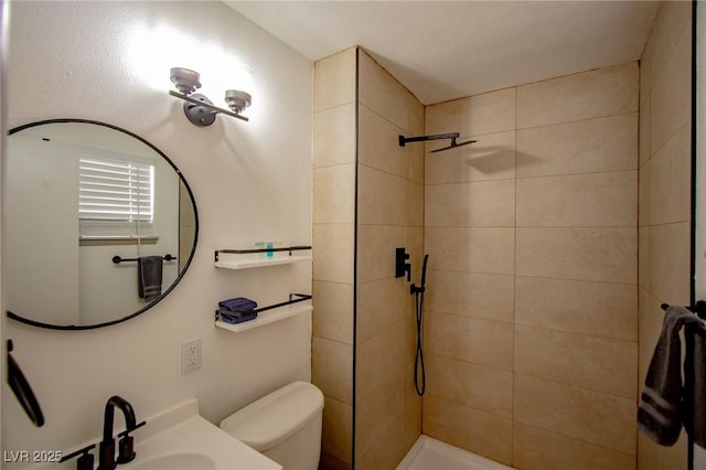 6301 Garwood Ave, Las Vegas, NV 89107 - bathroom with toilet, tiled shower, and a sink