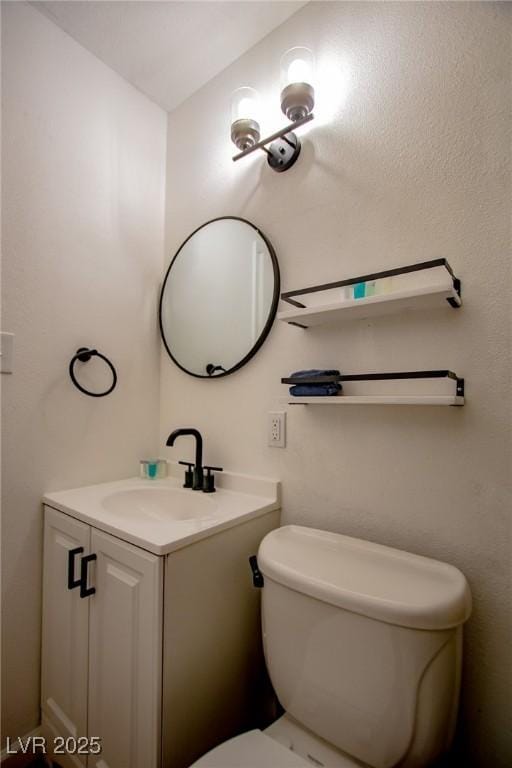 6301 Garwood Ave, Las Vegas, NV 89107 - half bathroom with vanity and toilet
