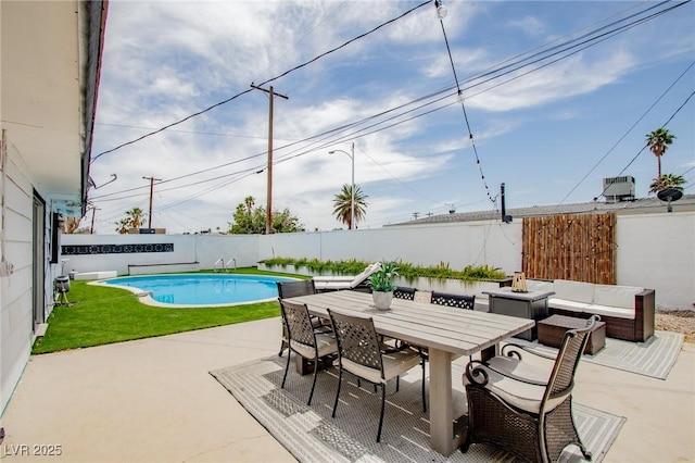 6301 Garwood Ave, Las Vegas, NV 89107 - view of pool with a fenced backyard, a patio area, outdoor dining space, and an outdoor hangout area