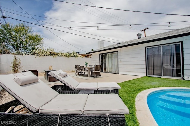 6301 Garwood Ave, Las Vegas, NV 89107 - view of swimming pool featuring outdoor dining space, a patio area, and an outdoor hangout area